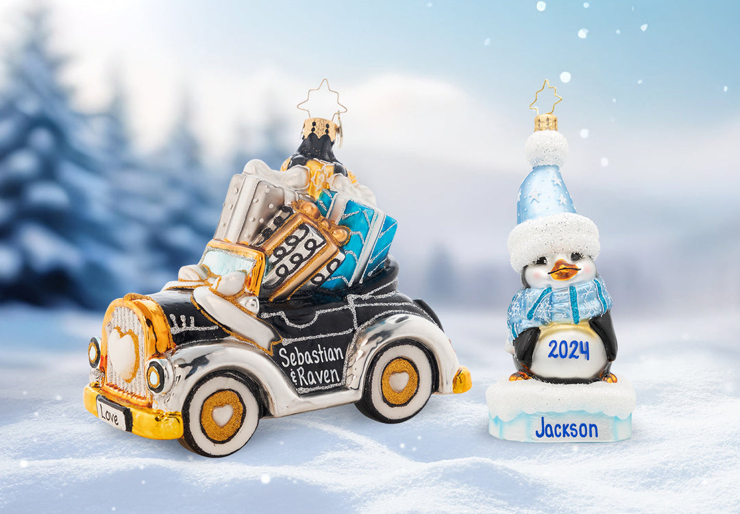 A just married vintage vehicle ornament with gifts inside and has the couple's names personalized on the side of the car. And a penguin ornament wearing a baby blue hat and scarf personalized with the birth year and baby's name.