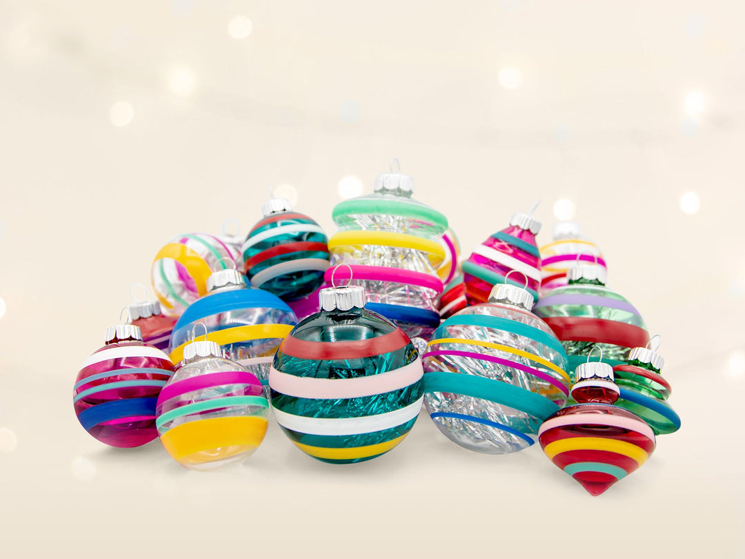 An assortment of brightly colored round striped ornaments.