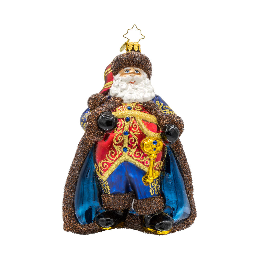 Keymaster Klaus ornament. Decked in a lush burgundy coat with champagne glitter accents and an intricate key motif. View of front.