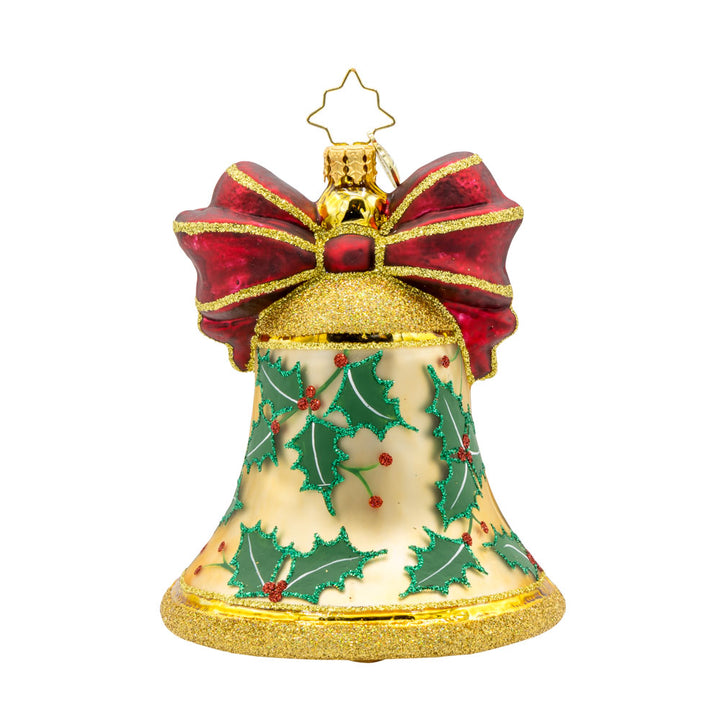 Bell Bliss ornament. A glittery gold bell donned with a red ribbon and hand-painted holly. View of back.
