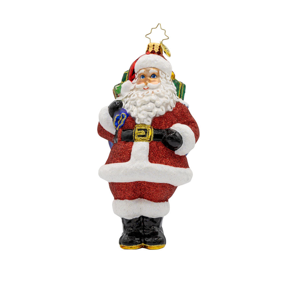 Jolly Old Kris Kringle ornament. Features Santa with his red suit, white beard, and bag of presents. View of front.