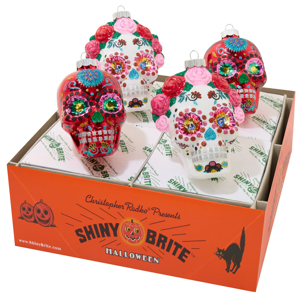Inspired by the intricate designs and patterns seen in Day of the Dead décor. 4 count floral skull set.