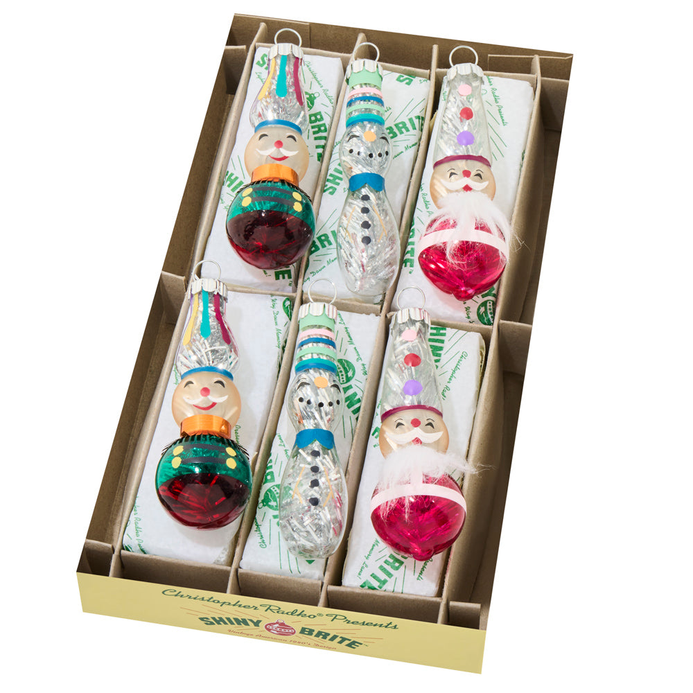 6 count Shiny Brite character ornament set. Features beloved characters adorned in our classic vivid vintage colorway.