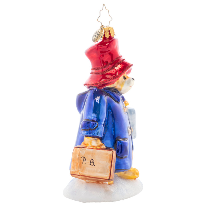 Side View - Ornament Description - One-Way Ticket to Paddington™ - Who doesn't want to be home for the holidays? Make the trip alongside Paddington™ as we reconnect with family and friends this holiday season in the spirit of togetherness.