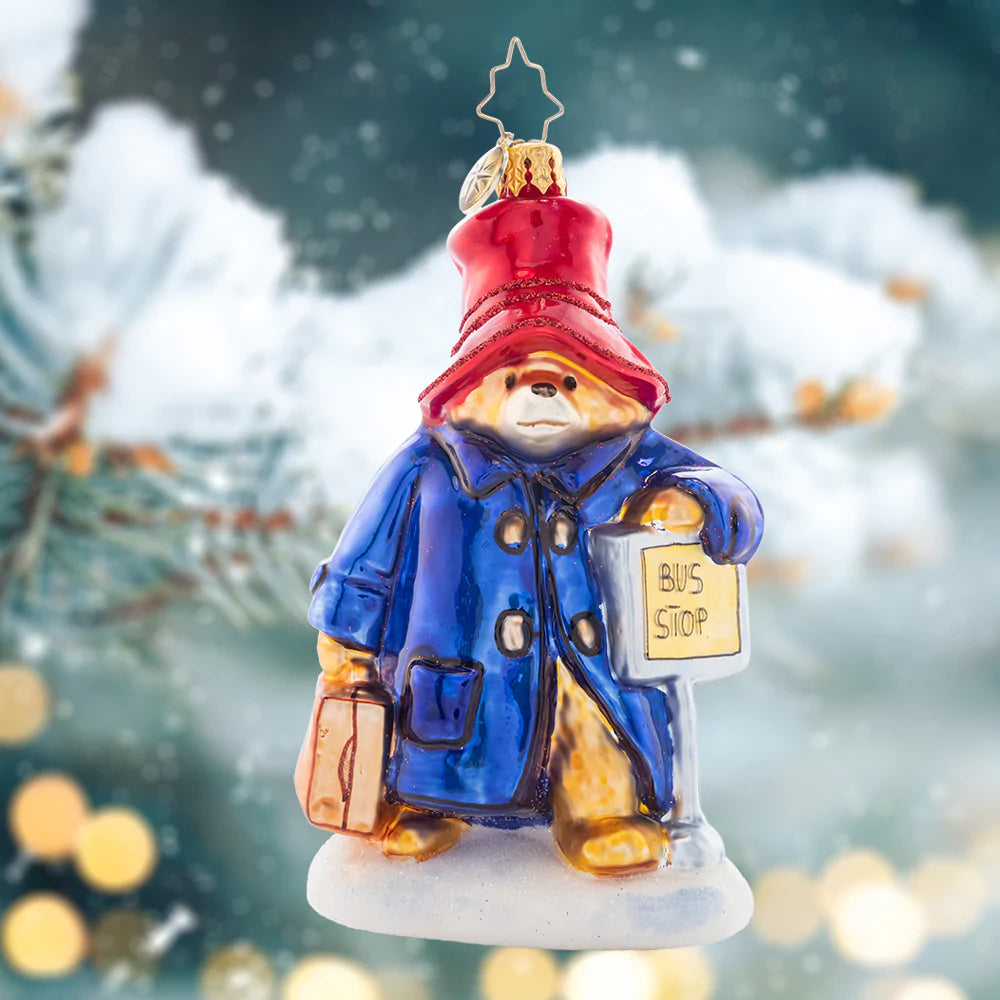 Ornament Description - One-Way Ticket to Paddington™ - Who doesn't want to be home for the holidays? Make the trip alongside Paddington™ as we reconnect with family and friends this holiday season in the spirit of togetherness.