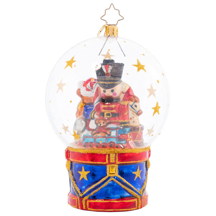 Snowglobe Description - Toyland Treasures Snow Globe: A bountiful globe full of toys captures the treasure of life's many joys. Partake in the Christmastime wonder and cherish the gifts beneath the globe they are under.