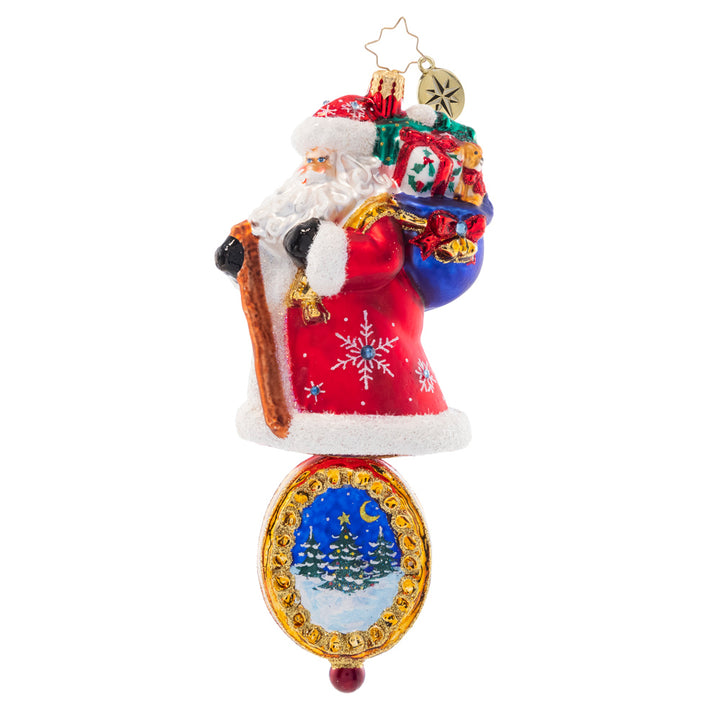 Side View - Ornament Description - Christmas Charm Claus: Dressed head-to-toe in red robes and sparkling stars, this trustworthy Santa is the perfect guiding light to lead you through Christmas night.