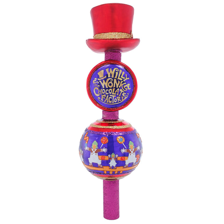 Christmas Finial Description - Wonka's Golden Ticket Topper: This whimsical Willy Wonka finial is inspired by the chocolate-filled film that is beloved by many. A unique piece decorated with dancing Oompa Loompas, colorful candies, and the coveted Golden Ticket, this tasty tree topper transports us to Wonka’s world. You can just imagine little Charlie Bucket looking up his Christmas tree and seeing Wonka's hat tipped ever so jauntily, stirring up all kinds of hopes, dreams, wonder and chocolate!
