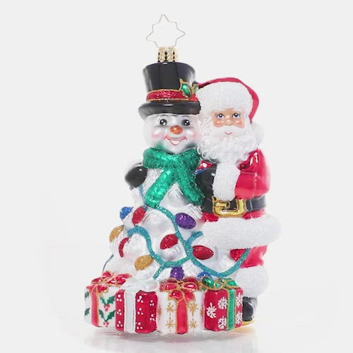 Video - Ornament Description - A Frosty Duo: Santa and his snowman pal have been through many a Christmas together. They know that the holidays are even more magical when spent with the ones you love!