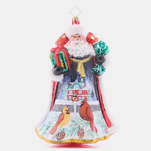 Video - Ornament Description - Santa's Snowy Scene - 2023!: Stunning as ever in a star-studded coat, Santa turns to reveal a beautiful snowy Christmas scene. Two little birds perch outside of a cozy cottage, waiting to see what Santa brought for Christmas! This video shows the ornament spinning slowly.