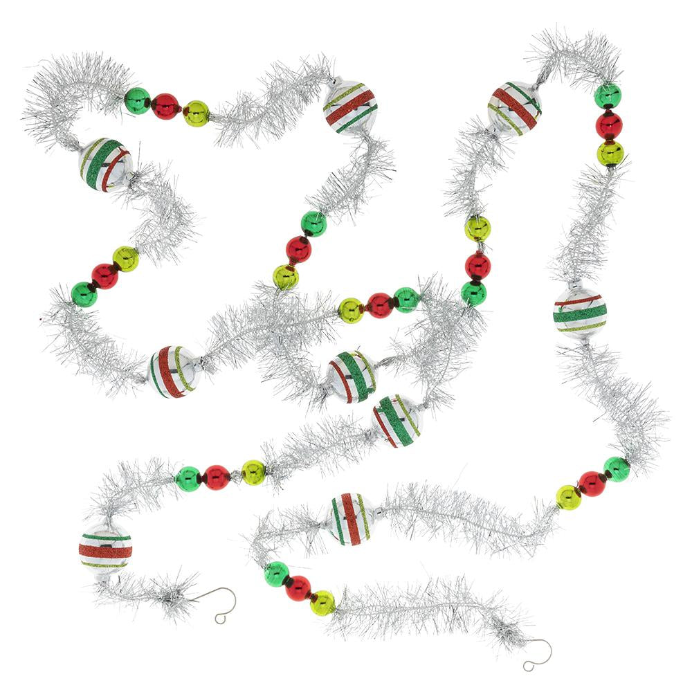 Garland/Trim Description - Holiday Splendor 1 Count 7" Tinsel Garland: Deck the halls! This glittering garland of silver tinsel and decorative glass rounds is the perfect way to add nostalgic sparkle to any Christmas decor.