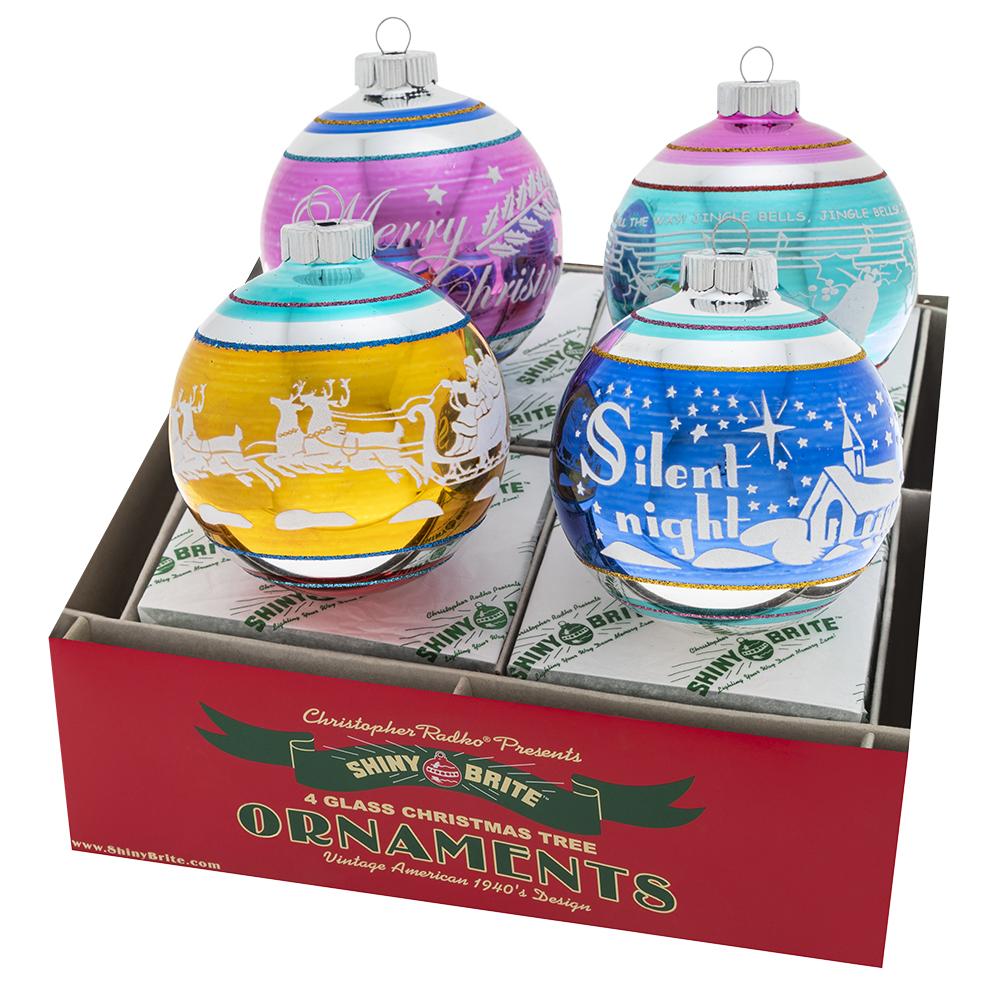 Ornaments - Description: Christmas Confetti 4 Count 4" Signature Flocked Rounds - Bright white Christmas vignettes pop against brightly-colored glass for the perfect vintage-inspired look!