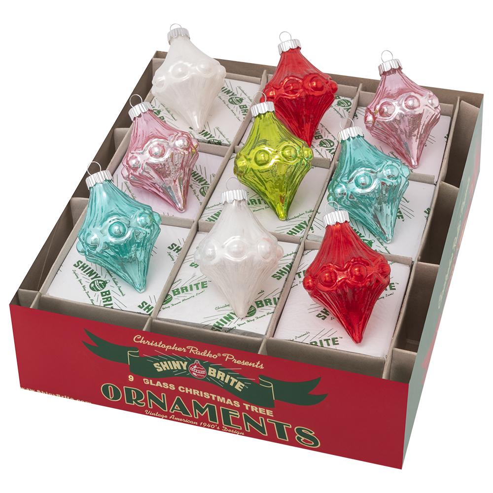 Ornament Set Description - Festive Fete 9 Count 2.5" Shapes: Ring in the season with dazzling diamonds! Each ornament in this twelve-count set sparkles in retro winter brights and vintage-inspired shapes.
