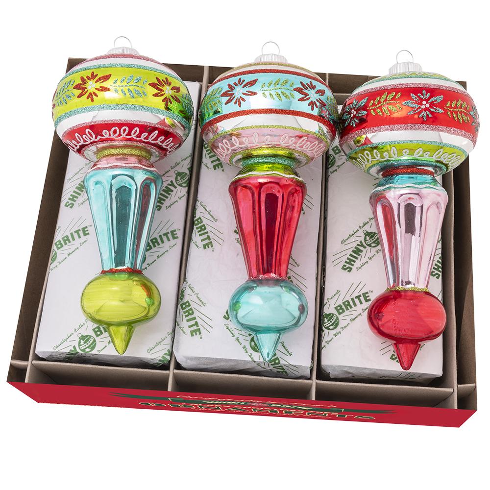 Ornament Set Description - Festive Fete 3 Count 7" Decorated Shapes: This set of three delicate glass ornaments stuns in eye-catching vintage-inspired shapes and a bright retro color palate. Recall your most cherished holiday memories as you hang these delightful pieces among the rest of your favorite ornaments.
