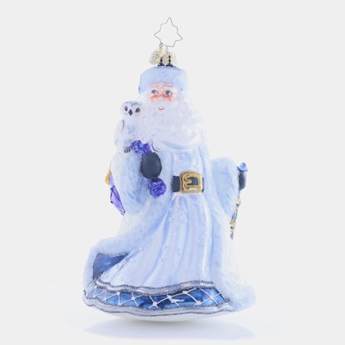 Video - Ornament Description - Winter Wonderland Santa: Strutting in a winter wonderland…Santa strolls comfortably with his bejeweled staff and cozy ice-blue coat. His owl friend sits atop his shoulder to keep him company. This video shows the ornament spinning slowly.