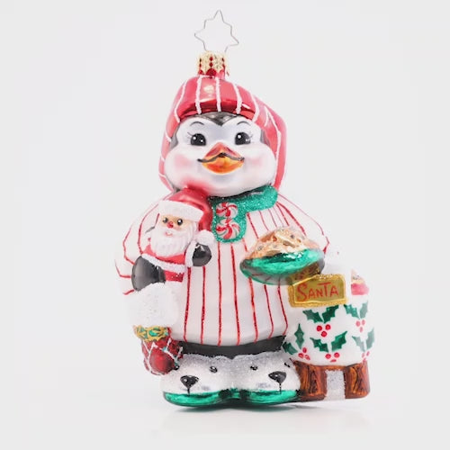 Video - Ornament Description - Ready For Santa: Dressed in his festive PJs and stocking cap, this adorable penguin pal is eagerly awaiting Christmas morning – he even baked cookies for Santa! This video shows the ornament spinning slowly. 