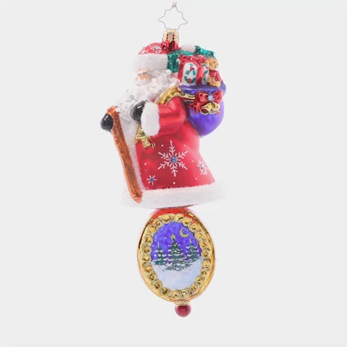 Video - Ornament Description - Christmas Charm Claus: Dressed head-to-toe in red robes and sparkling stars, this trustworthy Santa is the perfect guiding light to lead you through Christmas night.
