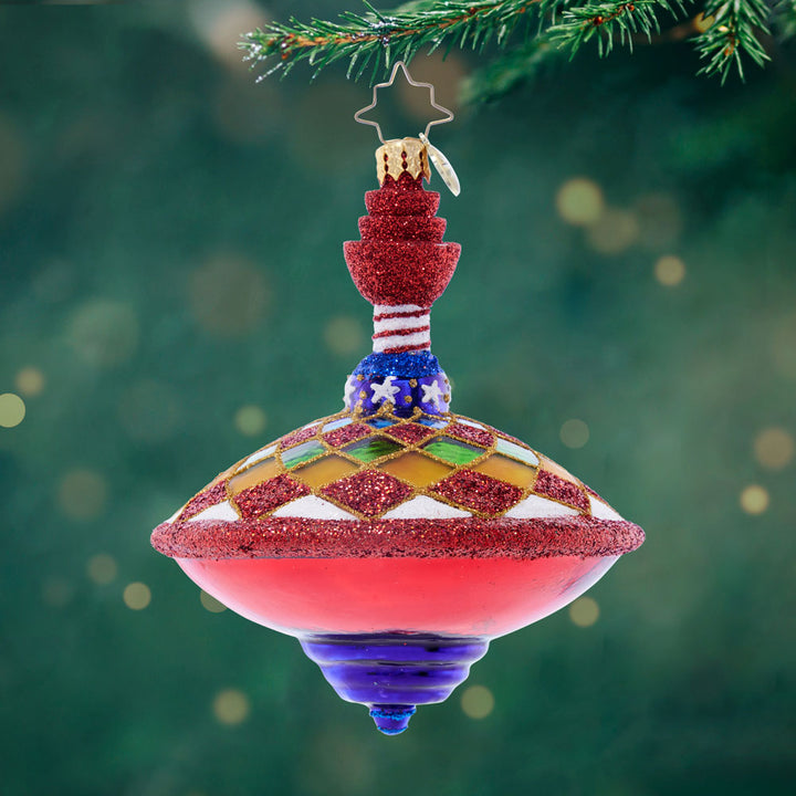 Front image - Spinning & Sparkle - (Sipping top toy ornament)