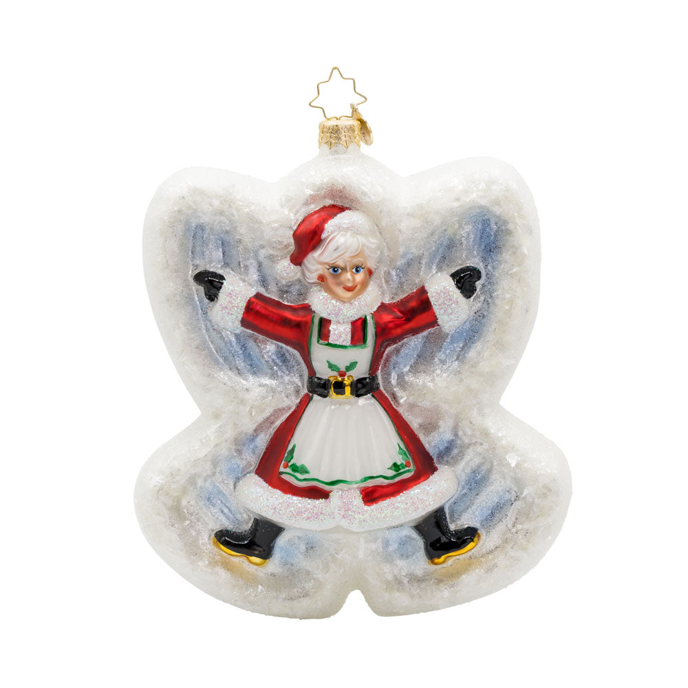 Snow Angel Duo ornament. Santa and Mrs. Claus are joyfully making snow angels in a blanket of sparkling snow. Mrs. Clause is seen on back. View of back. 