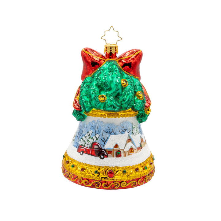 Adorned with a beautiful winter scene, sparkling gems, and a festive ribbon, this Scenic Chimes ornament is the perfect way to add a touch of magic to your Christmas tree. View of back.