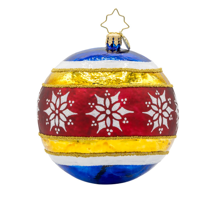 Nutcracker Spherical Splendor ornament. The ornament round features a nutcracker wearing red, blue, and gold, surrounded by painted stripes of the same colors. View of back.