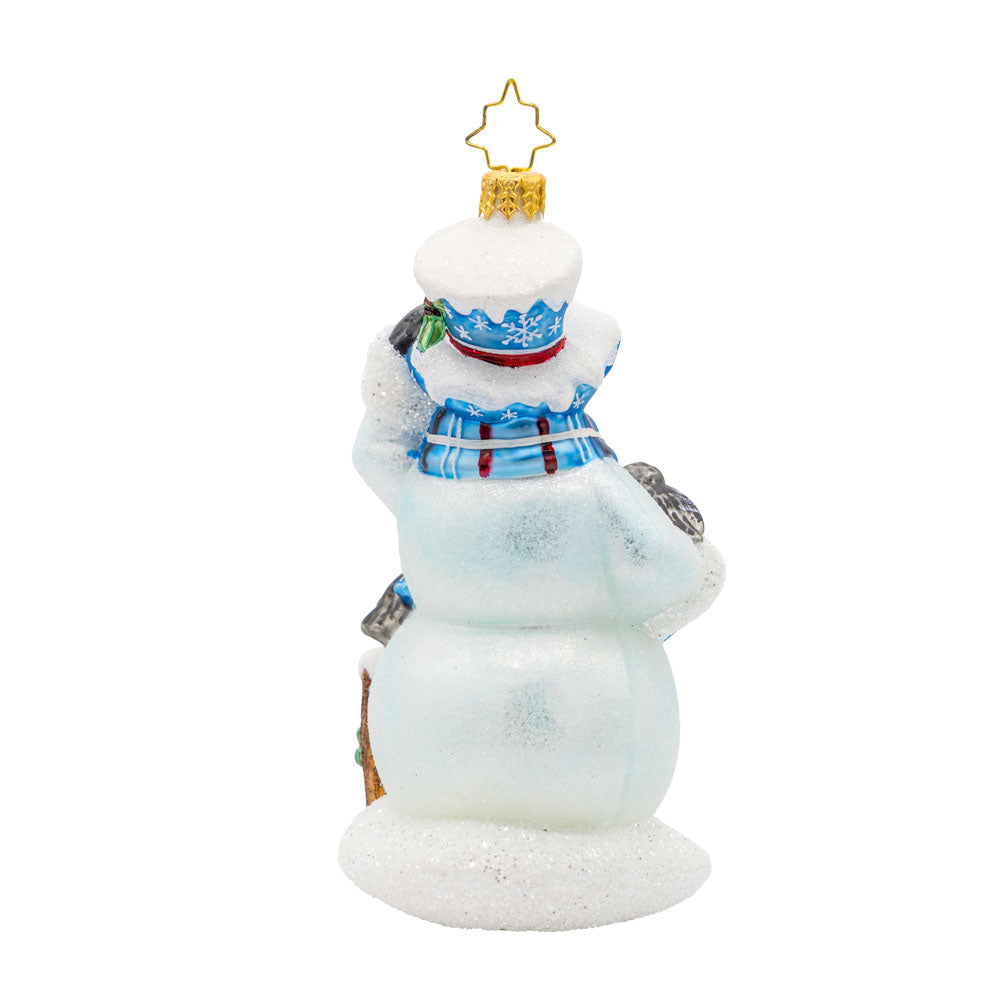 Snowy Perch Pals ornament. This snowman wears a blue and brown tartan scarf accompanied by feathered friends. View of back.