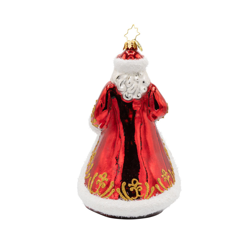 Cardinal Kris Kringle ornament. This enchanting ornament features a snowy scene, a charming cardinal companion, and a touch of regal elegance. View of back.