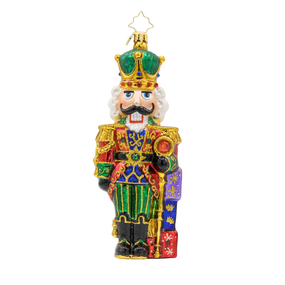 Yuletide Sentinel ornament. This Nutcracker features a sparkling coat and brave expression. View of front. 