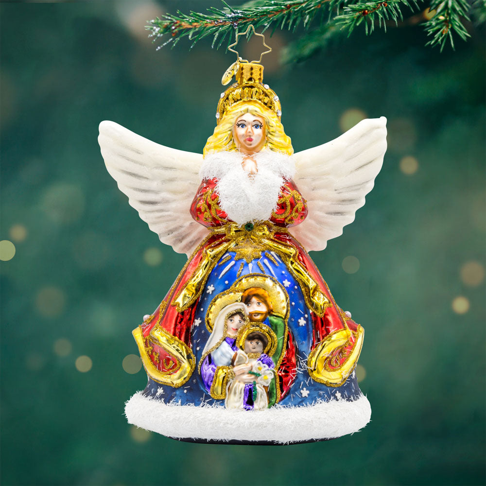 Nativity Guardian ornament. This angel features a beautiful nativity scene on her coat. View of front. 