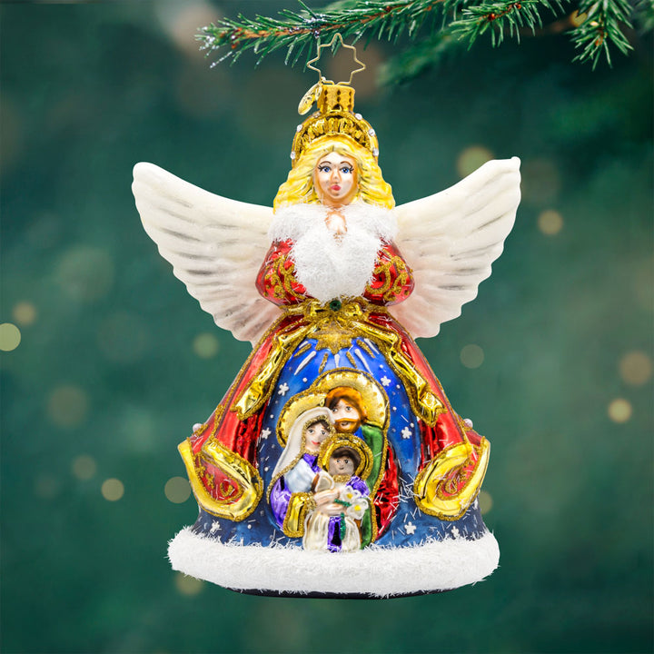 Nativity Guardian ornament. This angel features a beautiful nativity scene on her coat. View of front. 