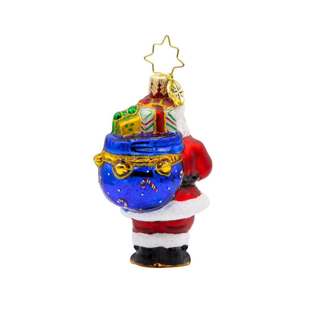 Presents on His Mind Gem ornament. Dressed in red, Santa carries a sack brimming with presents. View of back.