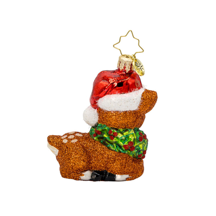 Fawning Over the Holidays Gem ornament. A laying fawn crowned with a wreath and Santa hat. View of back.