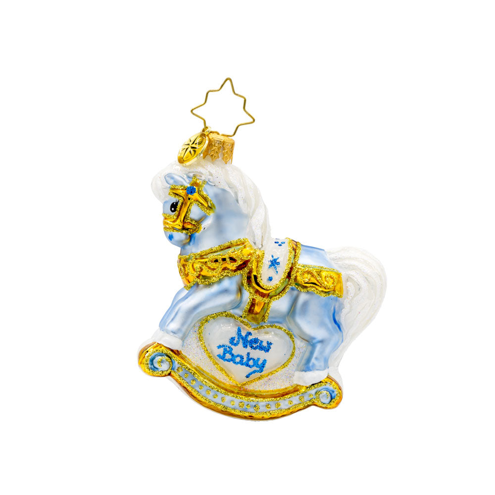 Baby's First Christmas Foal Gem ornament. A powder blue rocking horse with "New Baby" written on the side. View of front.