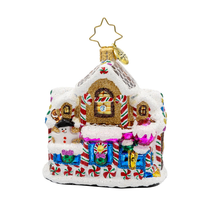 Sweet Tooth Station Gem ornament. A gingerbread train station decorated with sweet treats. View of back.