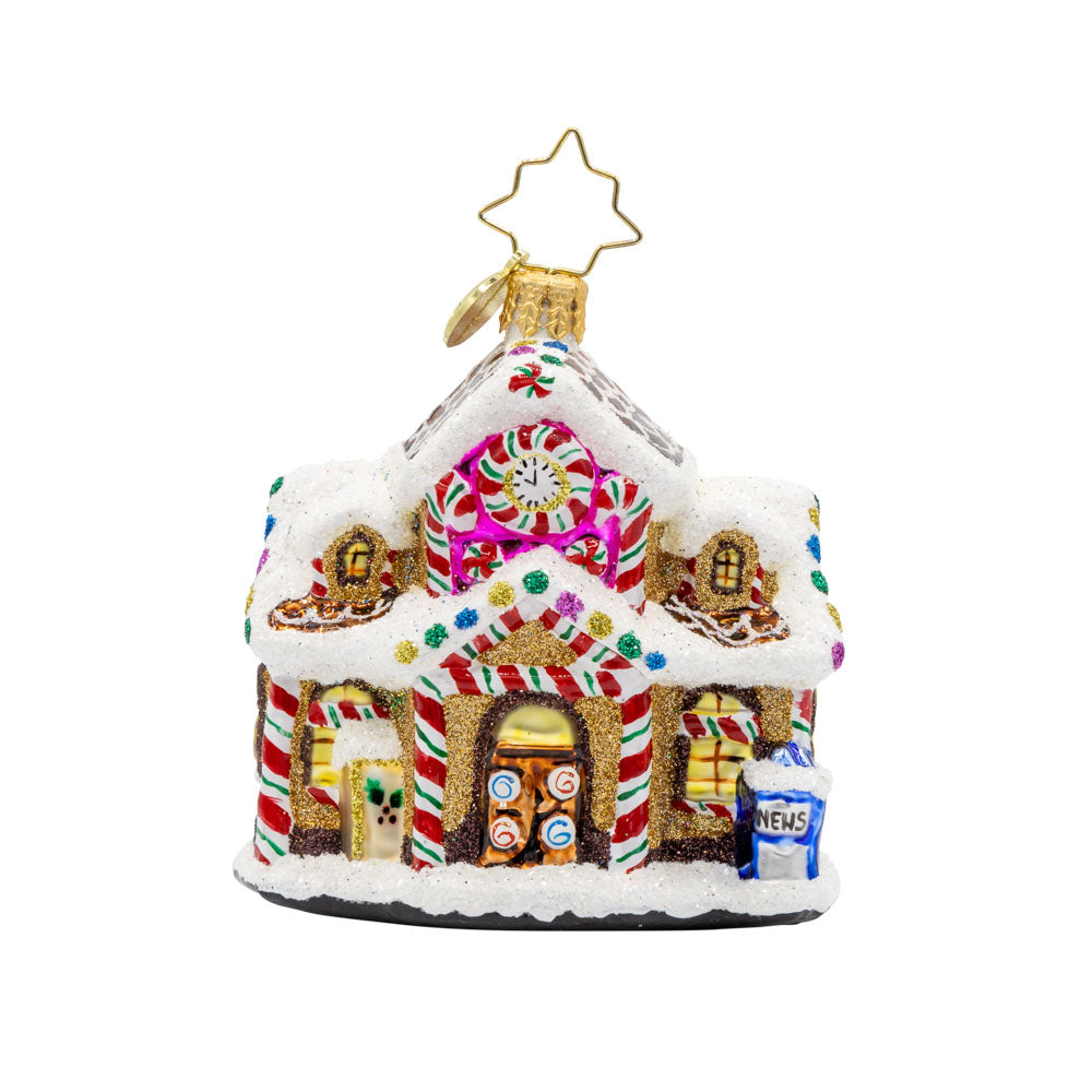Sweet Tooth Station Gem ornament. A gingerbread train station decorated with sweet treats. View of front. 