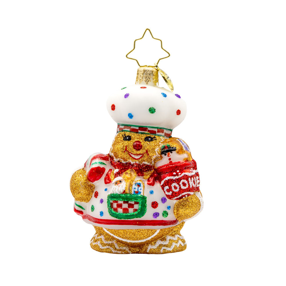Sugary Chef Gem ornament. This gingerbread man is dressed as a baker with a cookie jar in hand. View of front. 