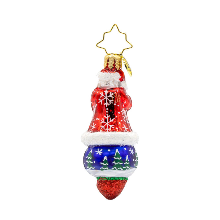 Santa's Splendid Snowscape Gem ornament. Santa stands atop a hand-painted scene of a snow-covered village. View of back.