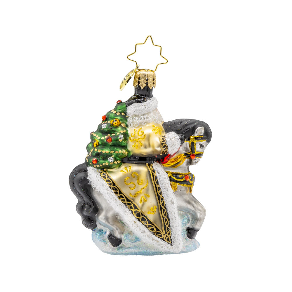 Golden Coat Calvary Gem ornament. Santa rides a white horse with a black mane, decorated in gold with a Christmas tree on his back. View of back.