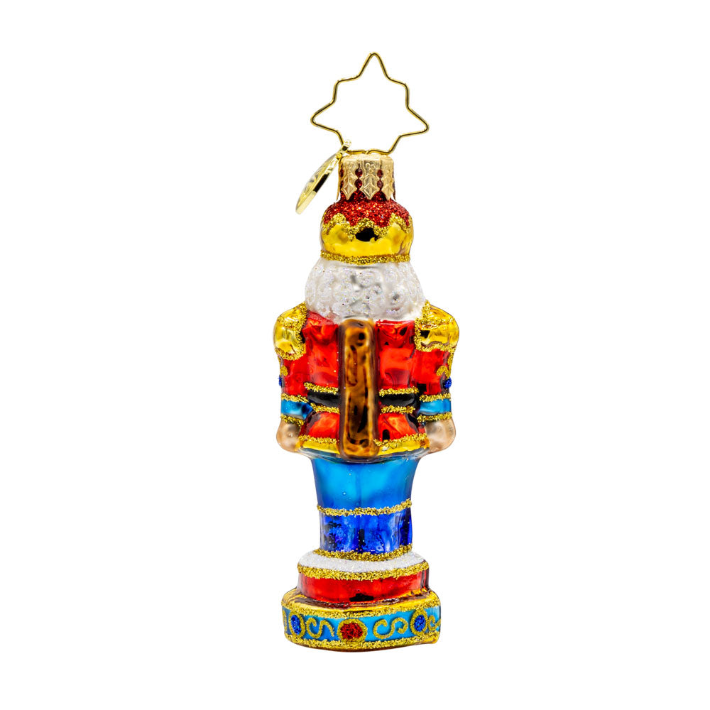Royal Elegance Nutcracker Gem ornament. This nutcracker dons a red, blue, and gold suit. View of back.