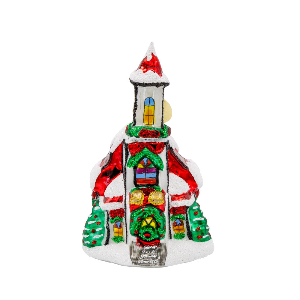 Holly Bell Chapel Gem ornament. A snow-covered chapel with a red roof adorned with wreathes galore. View of front. 