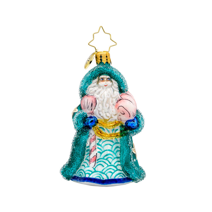 St. Nick's Nautical Noel Gem ornament. Santa is wearing a turquoise cloak adorned in pink seashells and starfish. View of front. 