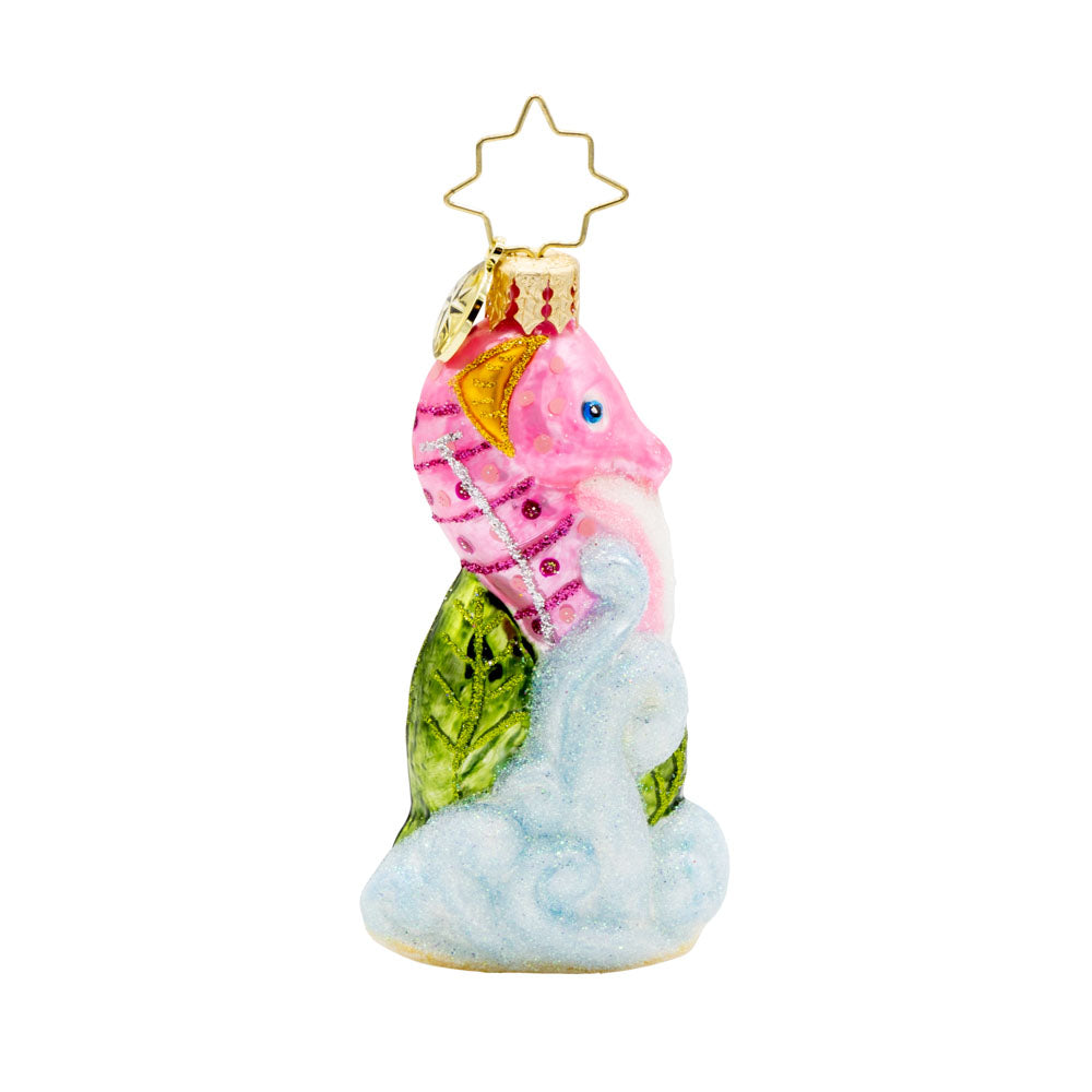 Sally Seahorse Gem ornament. A pink seahorse hides within emerald seaweed and seafoam. View of front. 