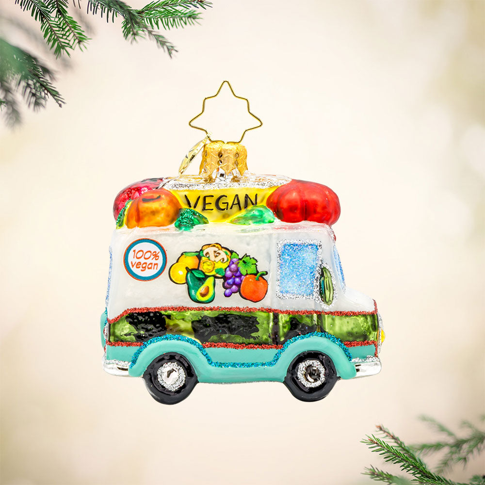 Veggie Express Gem ornament. Juicy fruits and crisp vegetables adorn this produce truck. View of front. 