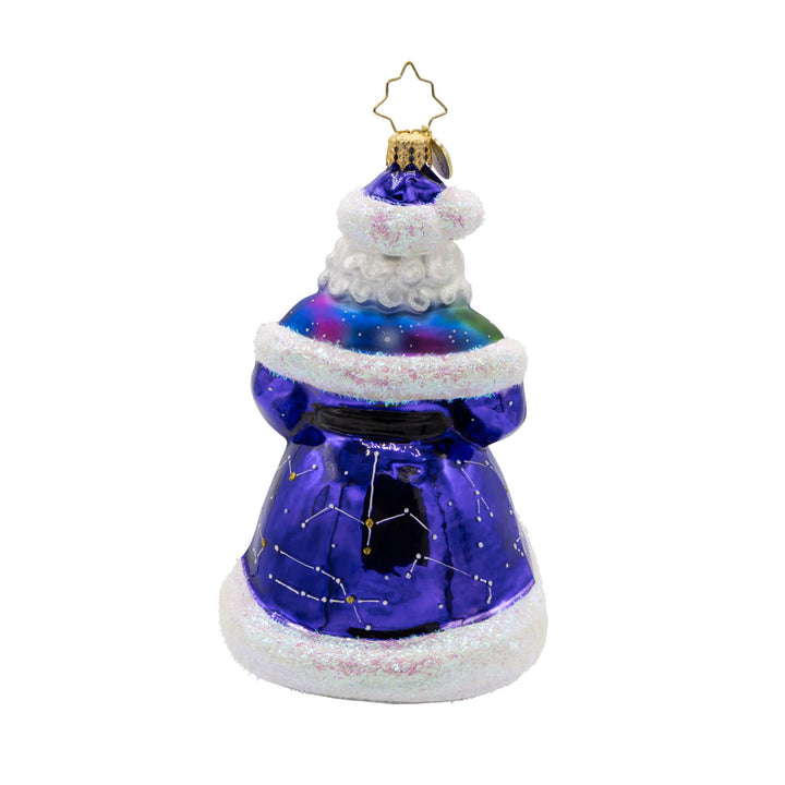 Celestial Claus ornament. This Santa has a galaxy swirling in his purple coat and constellations lighting up his robe. View of back.