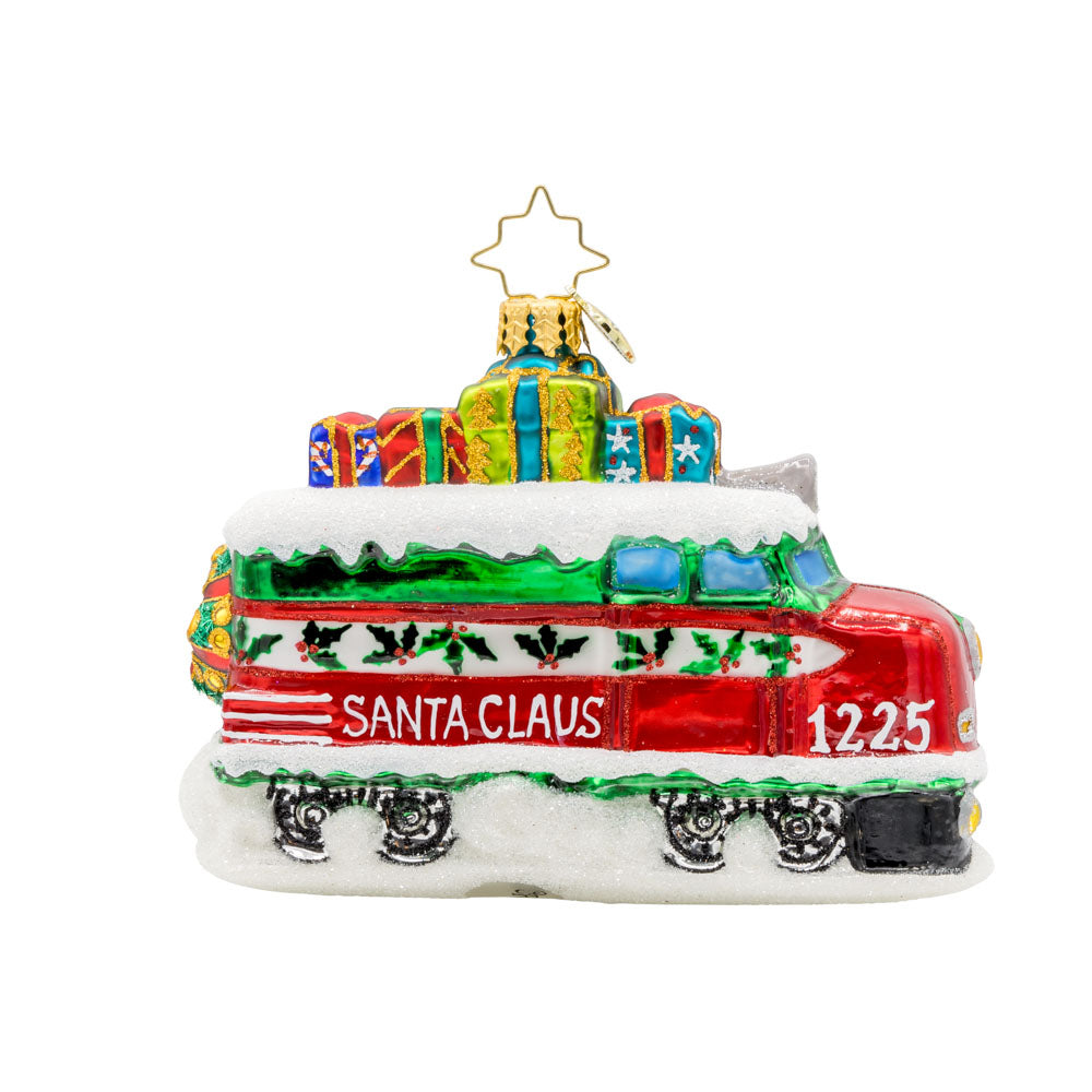 Claus the Conductor ornament.  This isn't your ordinary sleigh ride! Santa traded his reindeer for a train full of gifts. View of back.