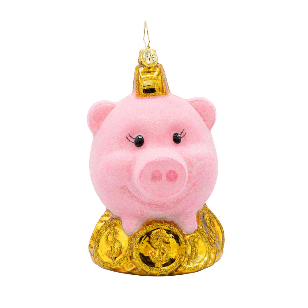 Piggy Pal ornament. Features a fuzzy bright pink piggy bank and sparkling gold coins. View of front.