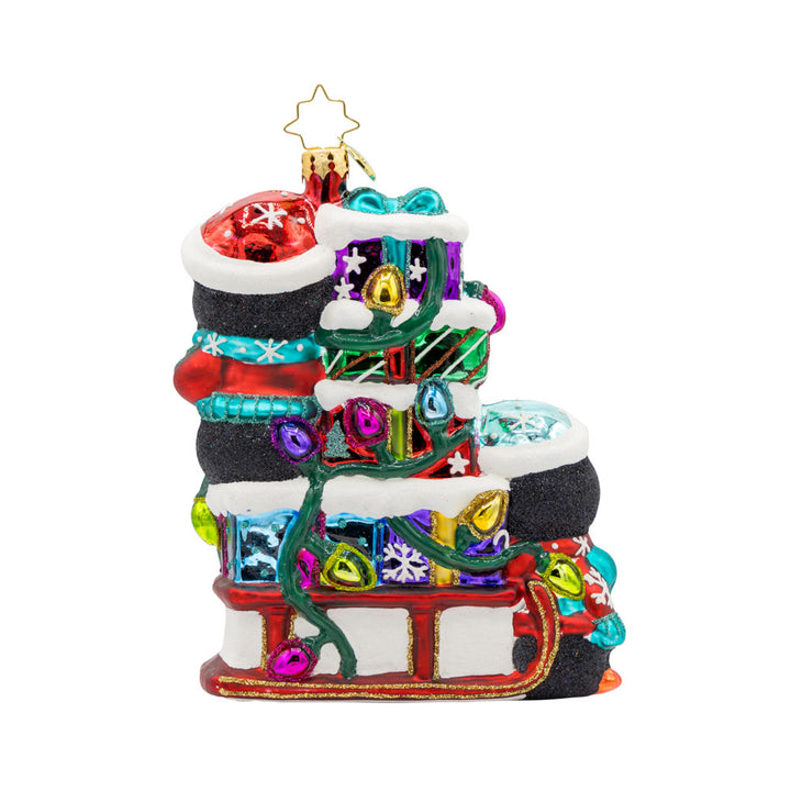 Flurry Friends Sleigh Ride ornament. Penguin pals on a holiday sleigh ride to deliver presents. View of back.