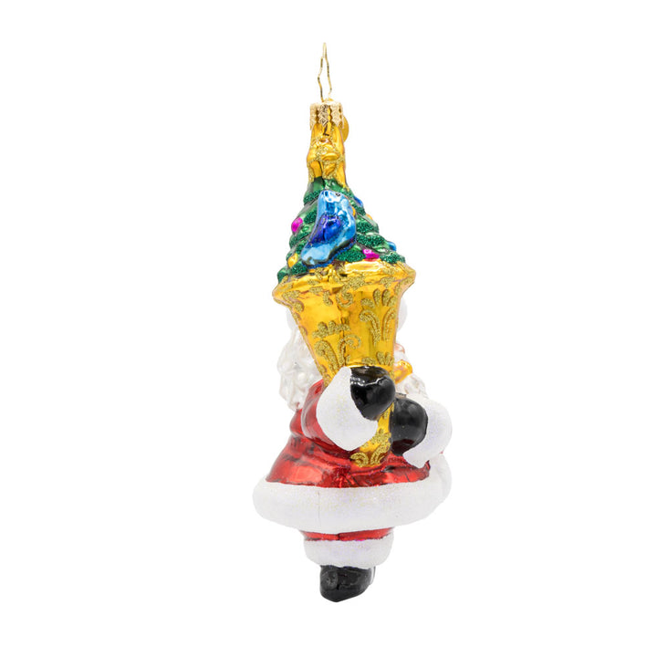 Tuba Tunes Claus ornament. Santa plays a tuba. View of right side.