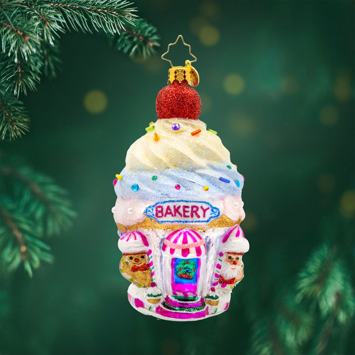 Confectionery Corner ornament.  A cupcake shop, complete with frosting, sprinkles, and all the festive flavors. View of front. 