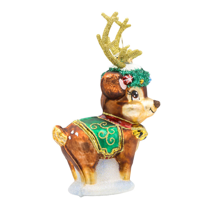 Festive Frosty Fawn ornament. This deer features sparkly antlers, a festive wreath, and jingling bells. View of left side.